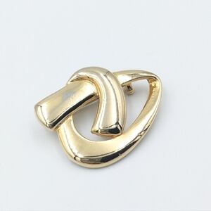 4/24$   Vintage gold tone twist abstract brooch pin